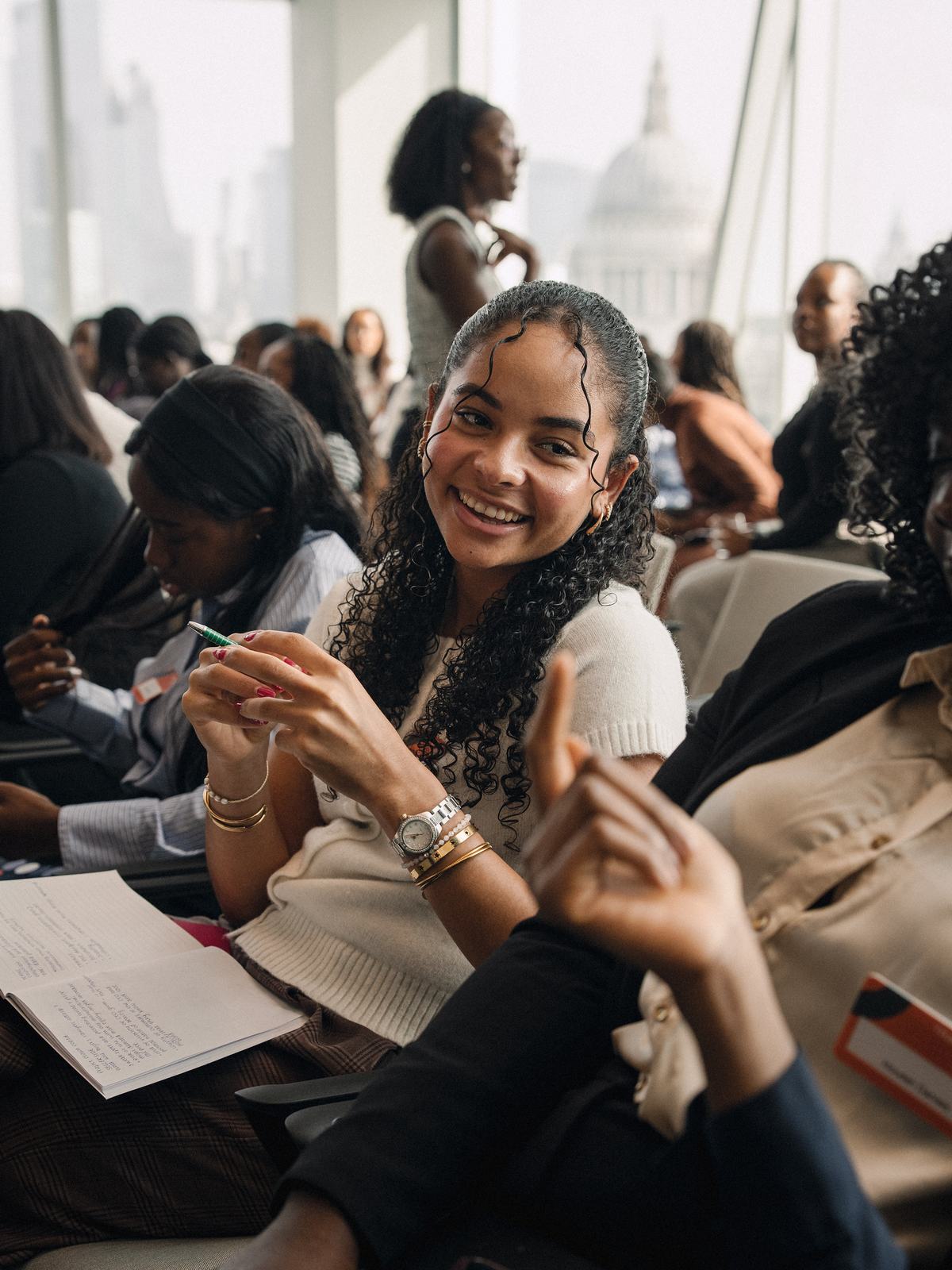 An attendee smiling during a session